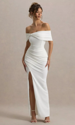 Eva | Robe longue blanche avec nœud Bardot et fente sur la cuisse Robes de mariée The Wedding Explorer