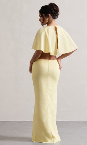 Isadora | Robe longue jaune pastel à fente et cape Robes longues invitées The Wedding Explorer