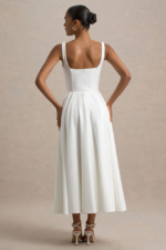 Parina – Robe mi-longue blanche à bretelles et ourlet volumineux Robes de mariée courtes The Wedding Explorer