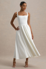 Parina – Robe mi-longue blanche à bretelles et ourlet volumineux Robes de mariée courtes The Wedding Explorer